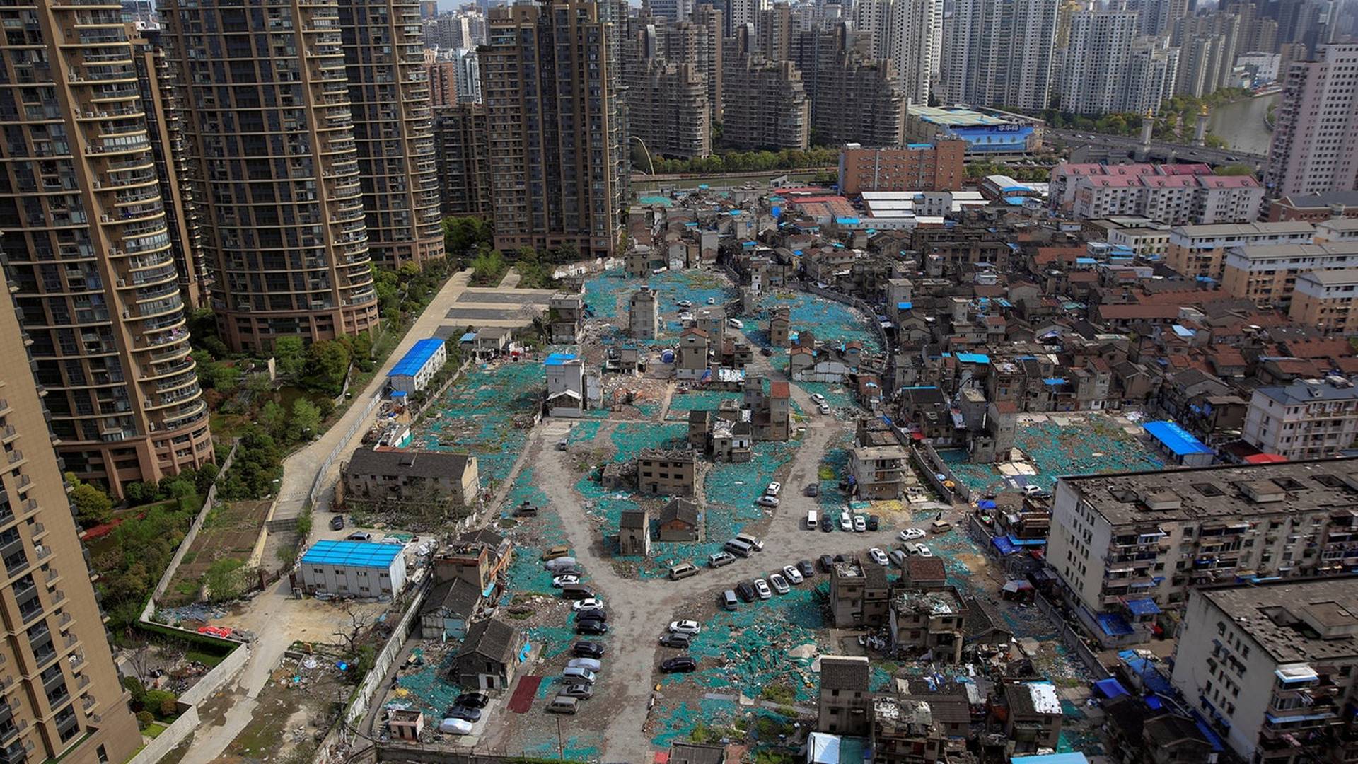 中國房地產行業向何處去？經濟學家們諫言